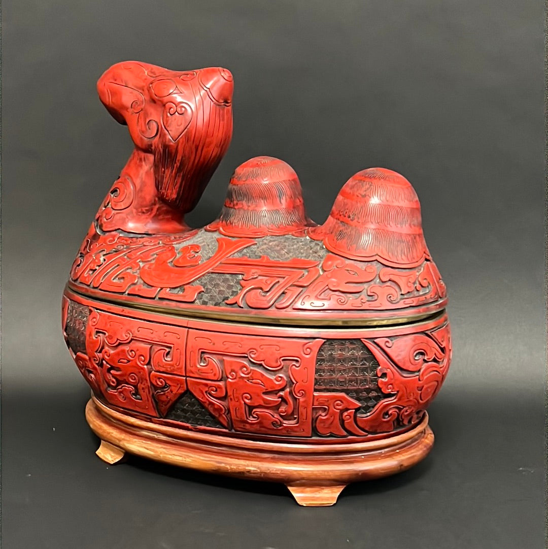 A Large Chinese Lacquered Cinnabar Camel Box