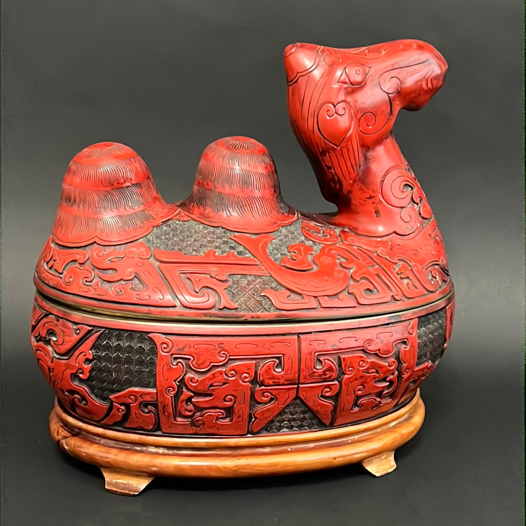 A Large Chinese Lacquered Cinnabar Camel Box
