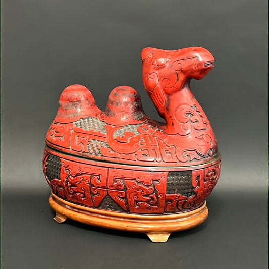 A Large Chinese Lacquered Cinnabar Camel Box
