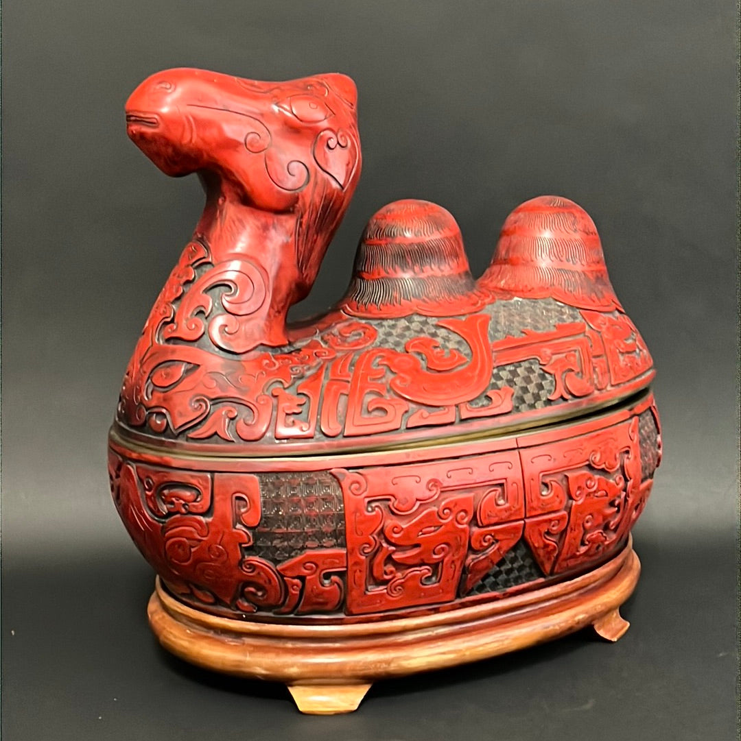 A Large Chinese Lacquered Cinnabar Camel Box